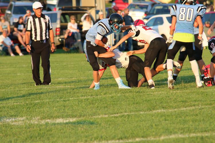 Greve breaking tackles.JPG