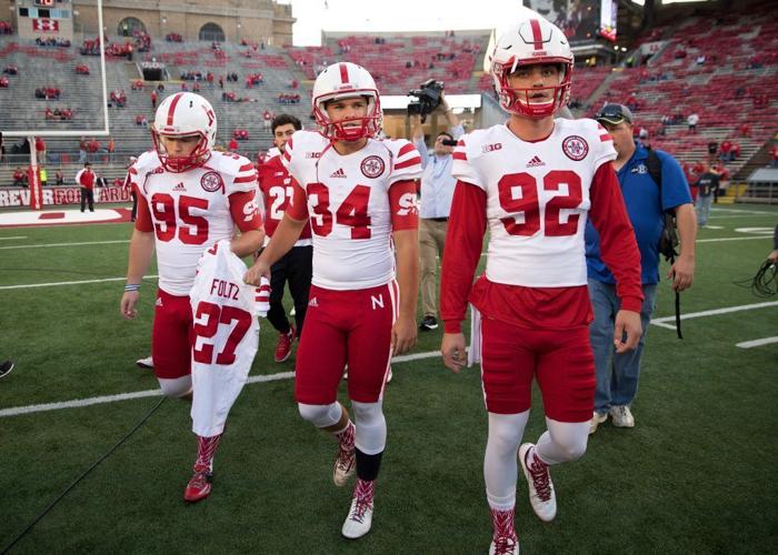 Wisconsin kicker Rafael Gaglianone joins Huskers in bringing Sam Foltz's jersey to the field