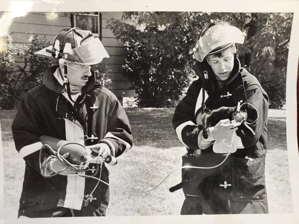 Henningfeld helping cat after fire