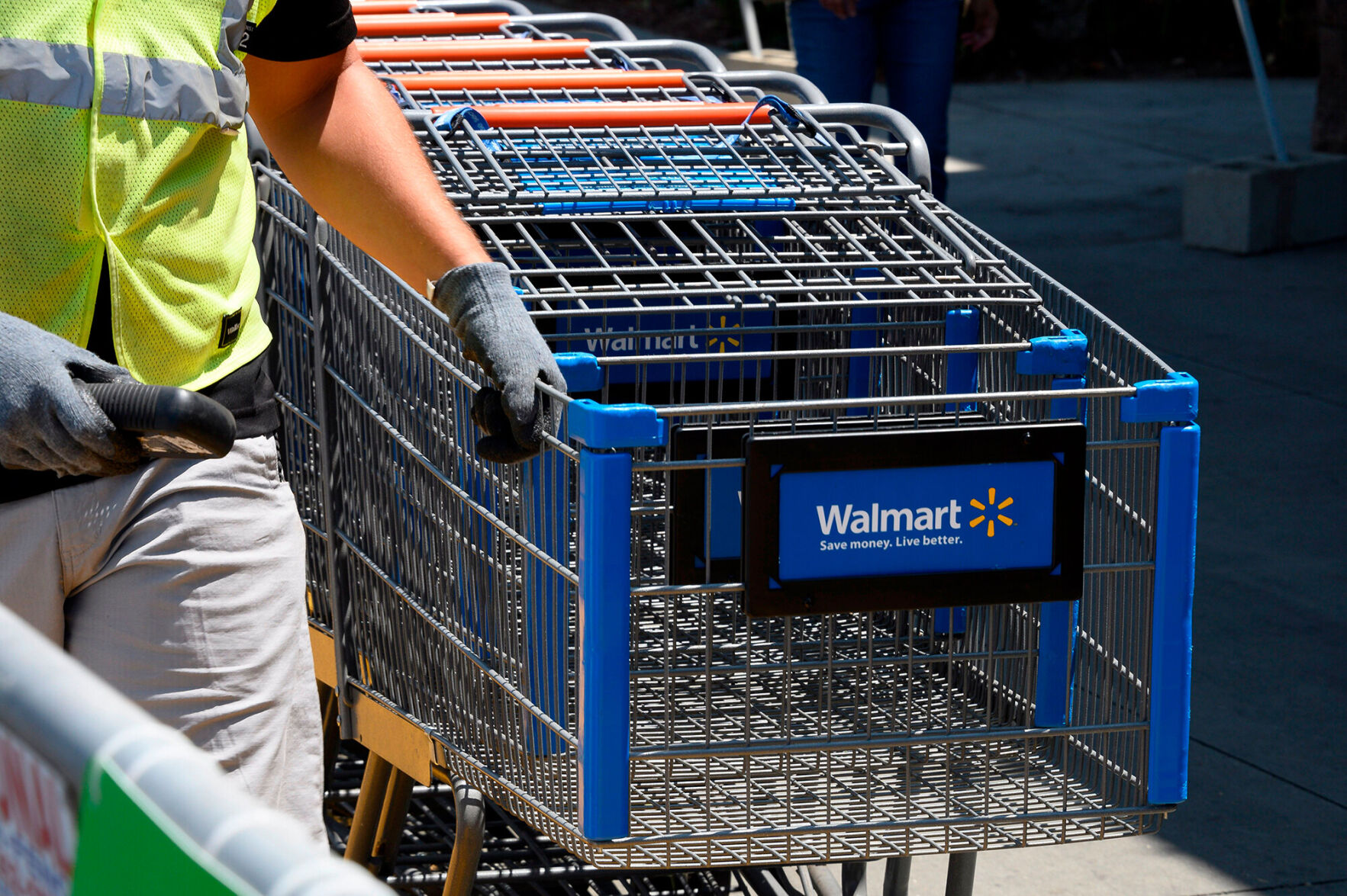 Walmart is paying its workers $388 million in holiday bonuses. Critics say it's not nearly enough
