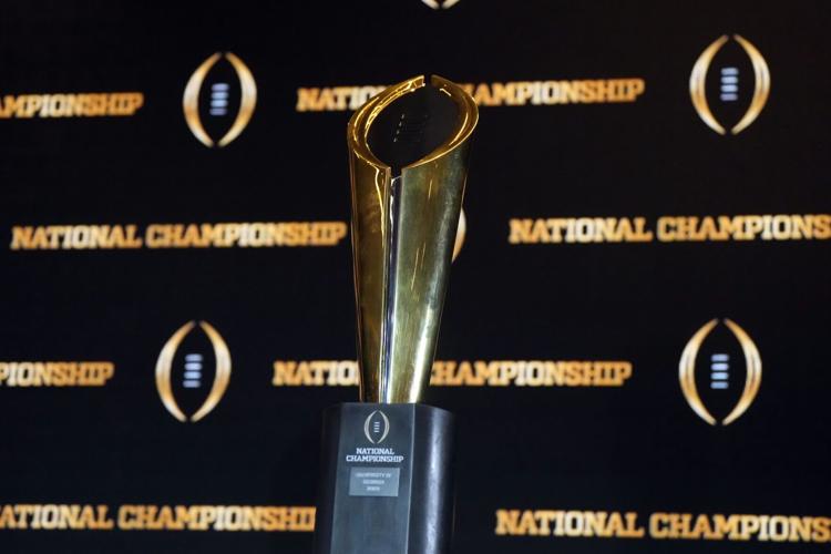 Jan 10, 2023; Los Angeles, CA, USA; The College Football Playoff National Championship trophy at CFP Champions press conference at Los Angeles Airport Marriott. Mandatory Credit: Kirby Lee-USA TODAY Sports