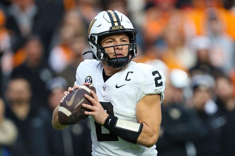 Nov 29, 2025; Knoxville, Tennessee, USA; Vanderbilt Commodores quarterback Diego Pavia (2) looks to pass against the Tennessee Volunteers during the first half at Neyland Stadium. Mandatory Credit: Randy Sartin-Imagn Images