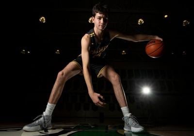 Carmel Sam Orme (1) poses for a photo Thursday, Nov 10, 2022 at Cathedral High School in Indianapolis.

High School Basketball Superteam