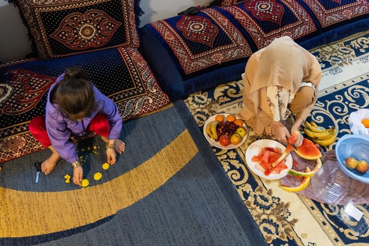 COPYRIGHT RESTRICTED Refugee SNAP Cuts