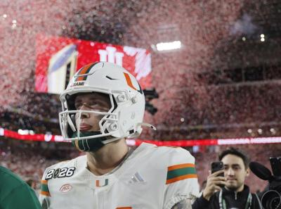 Miami quarterback Carson Beck leaves the field on Jan. 19, 2026, after the College Football Playoff National Championship game against Indiana at Hard Rock Stadium in Miami Gardens, Florida.