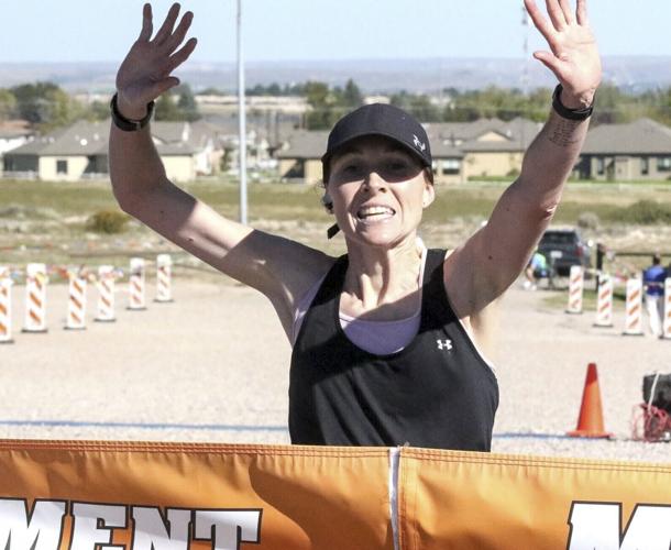 Wind tests Monument Marathon champions on a tough day for fast times on course