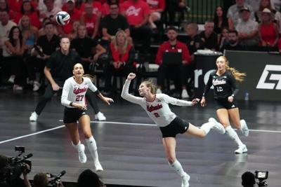 Aug 28, 2026; Arlington, TX, USA;  Nebraska Cornhuskers setter Bergen Reilly (2) dives for the ball during their volleyball match against the SMU Mustangs at AT&T Stadium.  Mandatory Credit: Chris Jones-Imagn Images