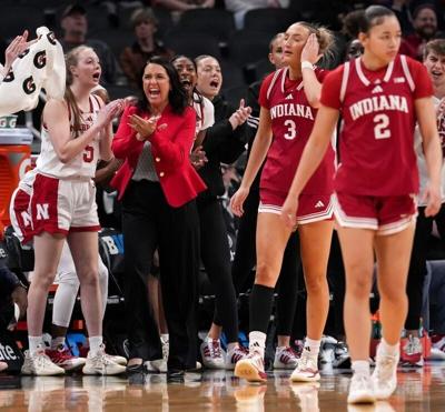 Nebraska Cornhuskers head coach Amy Williams celebrates as her team gains control of the ball during a Big Ten women's basketball tournament game against the Indiana Hoosiers on Wednesday, March 4, 2026, at Gainbridge Fieldhouse in Indianapolis. Indiana...