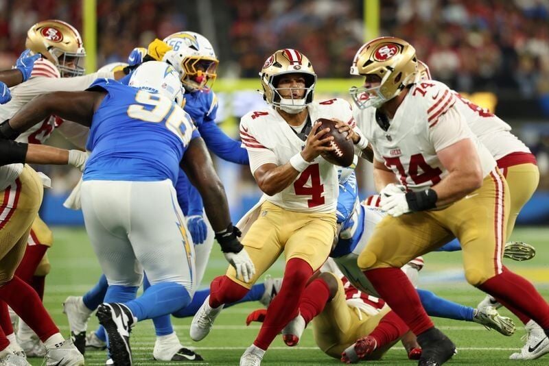 Aug 20, 2026; Inglewood, California, USA;  San Francisco 49ers quarterback Adrian Martinez (4) runs for a touchdown during the fourth quarter against the Los Angeles Chargers at SoFi Stadium. Mandatory Credit: Kiyoshi Mio-Imagn Images