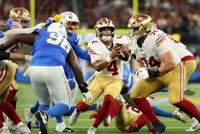 Aug 20, 2026; Inglewood, California, USA;  San Francisco 49ers quarterback Adrian Martinez (4) runs for a touchdown during the fourth quarter against the Los Angeles Chargers at SoFi Stadium. Mandatory Credit: Kiyoshi Mio-Imagn Images