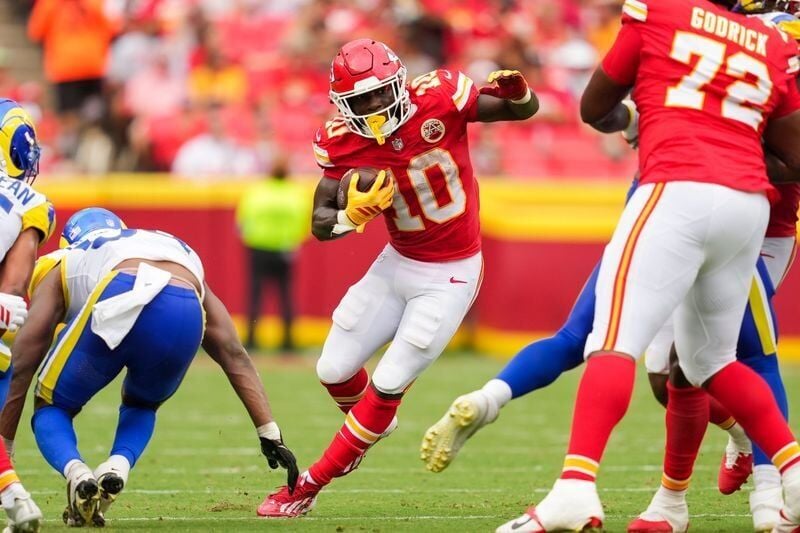 Aug 15, 2026; Kansas City, Missouri, USA; Kansas City Chiefs running back Emmett Johnson (10) runs the ball during the second half against the Los Angeles Rams at Arrowhead Stadium. Mandatory Credit: Jay Biggerstaff-Imagn Images