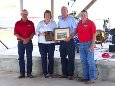 Kaye and Mark Lidolph with Weyand Family Farm Pioneer Award at Butler County Fair