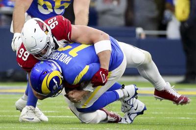 Arizona Cardinals defensive end J.J. Watt sacks Los Angeles Rams quarterback John Wolford during the second half at SoFi Stadium on Sunday, Nov. 13, 2022, in Los Angeles.