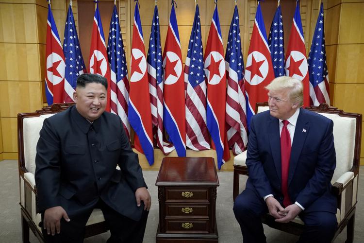 FILE PHOTO: U.S. President Trump and North Korean leader Kim Jong Un meet at the Korean Demilitarized Zone