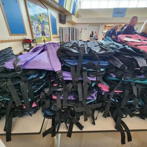 dobytown-backpacks- p4 - pile of backpacks