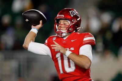 Nov 8, 2025; Fort Collins, Colorado, USA; UNLV Rebels quarterback Anthony Colandrea (10) attempts a pass in the third quarter against the Colorado State Rams at Sonny Lubick Field at Canvas Stadium. Mandatory Credit: Isaiah J. Downing-Imagn Images