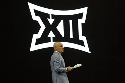 Commissioner Brett Yormark of the Big 12 Conference speaks with the media during the Big 12 Media Days at The Ford Center at The Star on July 8, 2025, in Frisco, Texas.