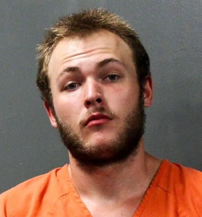 Seven arrested, accused of possessing guns and drugs