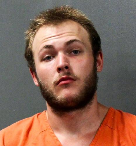 Seven arrested, accused of possessing guns and drugs