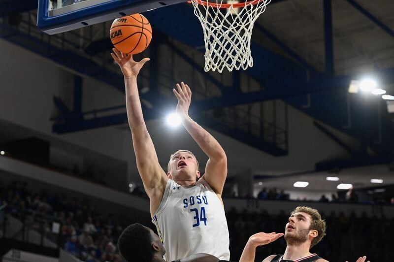 South Dakota State Jackrabbits center Damon Wilkinson (34) shoots the ball on Thursday, Feb. 13, 2025, at First Bank and Trust Arena in Brookings, S.D.