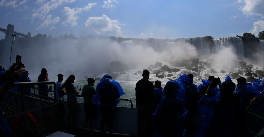 A view of Niagara Falls from the air, by boat and on foot