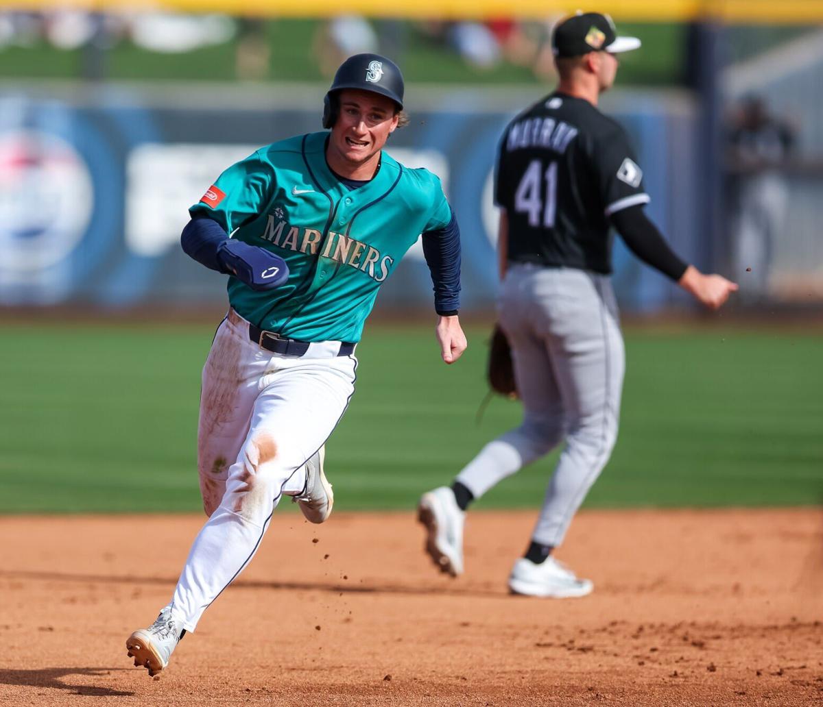 Colt Emerson of the Seattle Mariners runs the bases en route to scoring during the fourth inning of the spring training game against the Chicago White Sox at Peoria Stadium on Feb. 24, 2026, in Peoria, Arizona.
