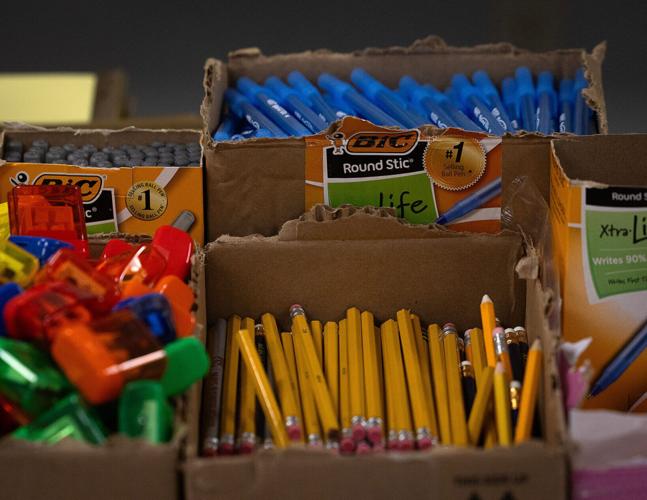 Families receive back-to-school supplies inside the Daffin Park Clubhouse in Panama City, Florida, August 1, 2026. The event was organized by the City's Department of Parks, Culture and Recreation. (Tyler Orsburn/Panama City News Herald)