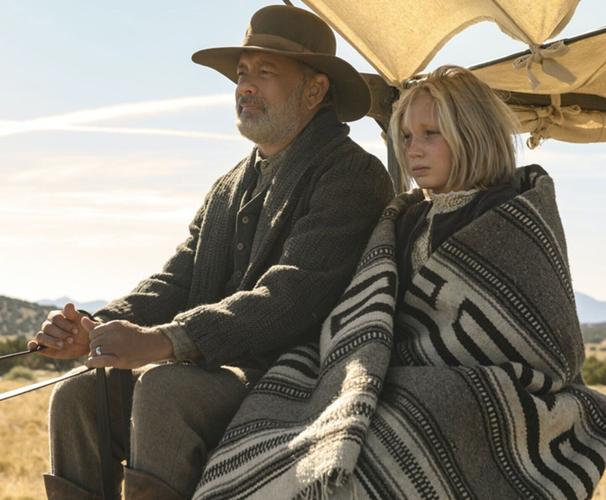 Tom Hanks (left) and Helena Zengel star in "News of the World," a movie based on the novel by Paulette Jiles.