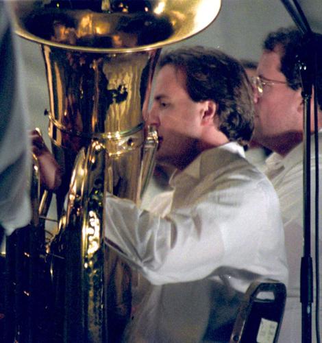 Orlando Philharmonic Orchestra tuba player Robert Carpenter plays in a 1997 concert in Kissimmee.