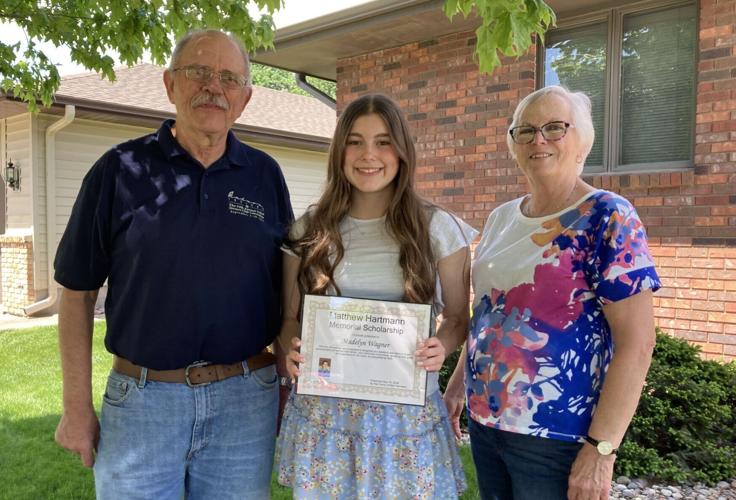 Madelyn Wagner receives certificate