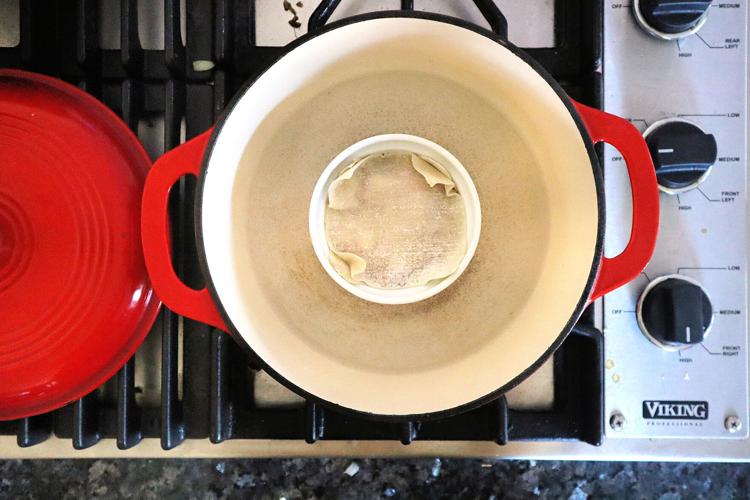 Place ramekin in a large pot and add water halfway up the sides.