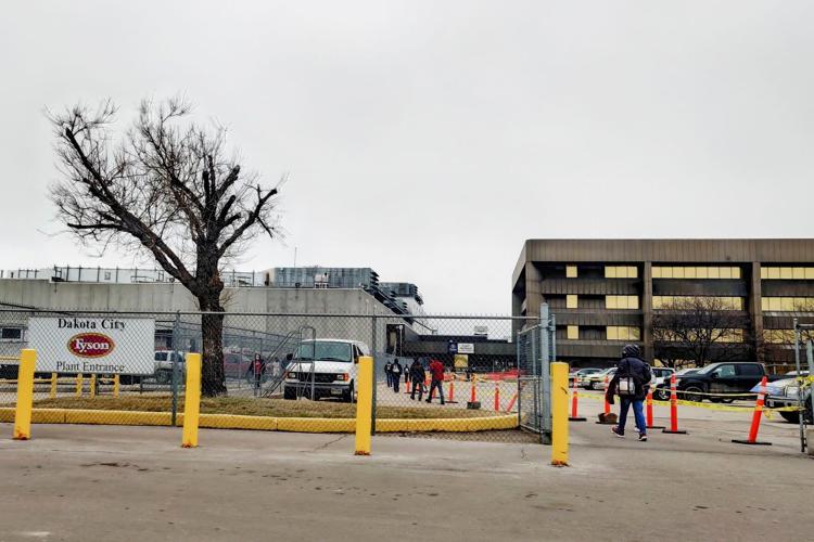 Workers enter Tyson Fresh Meats