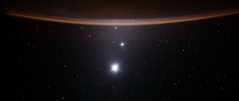 Earth, Jupiter, Venus photographed from the International Space Station.
