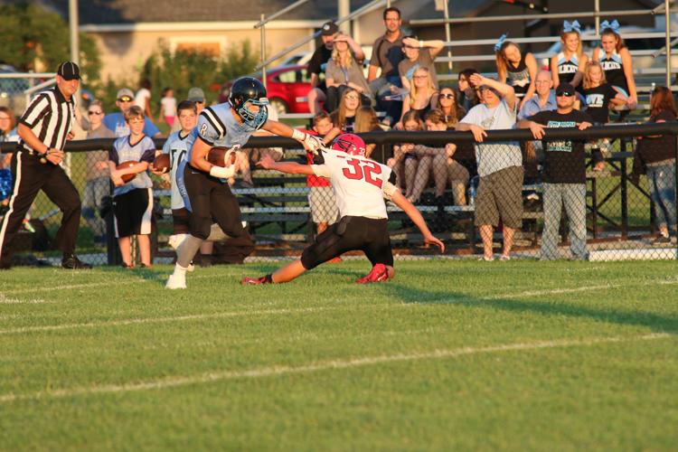 Siems escapes tackle for TD.JPG