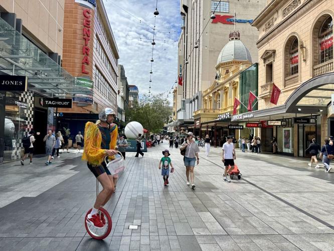 Adelaide's Rundle Mall is full of shops, public art and pedestrians.