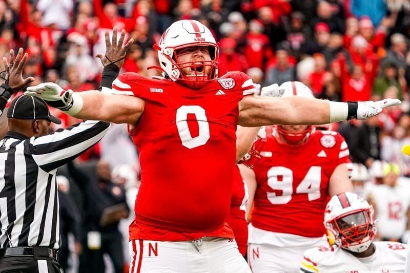 Nov 11, 2023; Lincoln, Nebraska, USA; Nebraska Cornhuskers defensive lineman Nash Hutmacher (0) celebrates after getting a stop on fourth down against the Maryland Terrapins during the third quarter at Memorial Stadium. Mandatory Credit: Dylan Widger-US...