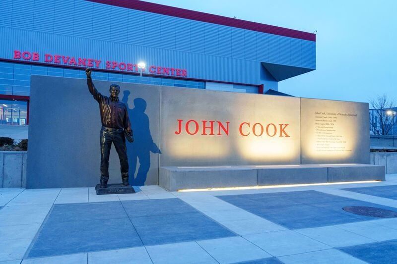 Dec 12, 2025; Lincoln, NE, USA; The statue of former Nebraska Cornhuskers head coach John Cook is pictured outside the arena before the NCAA Women's National Volleyball Regional matches at Bob Devaney Sports Center. Mandatory Credit: Dylan Widger-Imagn ...