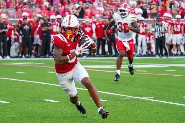 Oct 3, 2026; Lincoln, Nebraska, USA;  Nebraska Cornhuskers wide receiver Kwazi Gilmer (3) runs after a catch for a touchdown against Maryland Terrapins linebacker Carlton Smith (32) during the fourth quarter at Memorial Stadium.  Mandatory Credit: Dylan...
