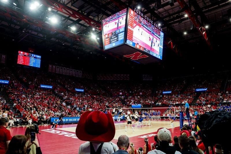 Dec 12, 2025; Lincoln, NE, USA; The Nebraska Cornhuskers and Kansas Jayhawks play during the third set at Bob Devaney Sports Center. Mandatory Credit: Dylan Widger-Imagn Images