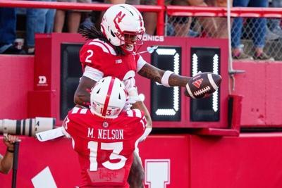 Sep 12, 2026; Lincoln, Nebraska, USA;  Nebraska Cornhuskers wide receiver Jacory Barney Jr. (2) and running back Mekhi Nelson (13) celebrate after a touchdown against the Bowling Green Falcons during the first quarter at Memorial Stadium.  Mandatory Cre...