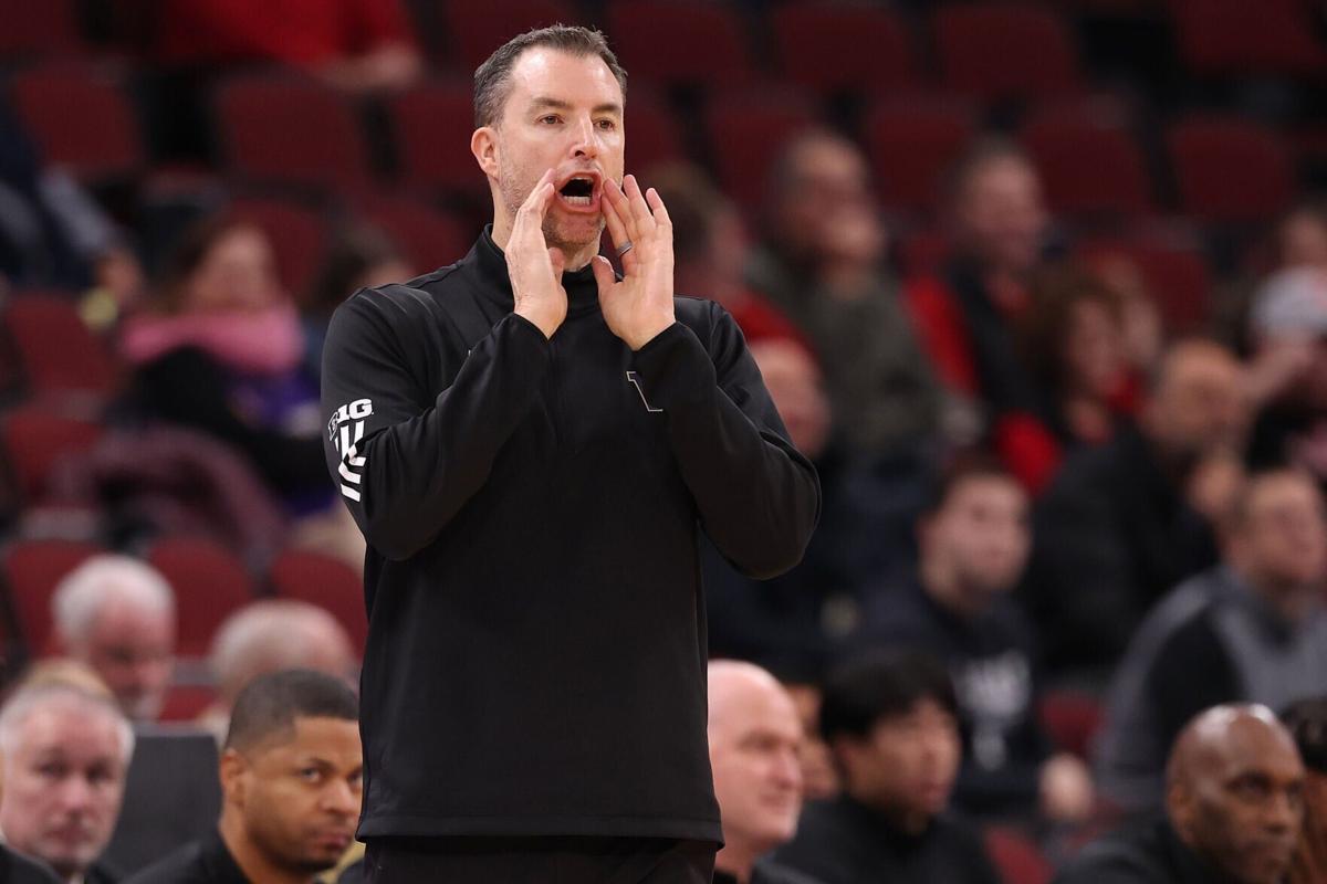 Washington head coach Danny Sprinkle reacts in the second half against Wisconsin during the third round of the Big Ten Tournament at the United Center on March 12, 2026, in Chicago.