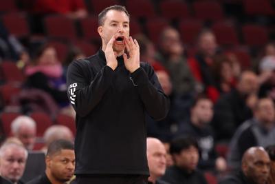 Washington head coach Danny Sprinkle reacts in the second half against Wisconsin during the third round of the Big Ten Tournament at the United Center on March 12, 2026, in Chicago.