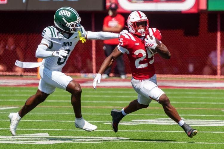 Sep 5, 2026; Lincoln, Nebraska, USA;  Nebraska Cornhuskers running back Jamal Rule (25) runs against Ohio Bobcats defensive back Barry Dillon (8) during the third quarter at Memorial Stadium.  Mandatory Credit: Dylan Widger-Imagn Images