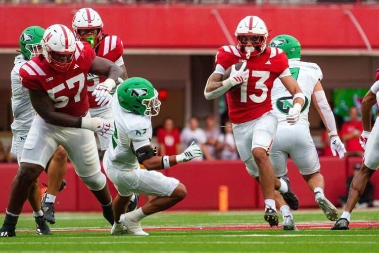 Sep 19, 2026; Lincoln, Nebraska, USA;  Nebraska Cornhuskers running back Mekhi Nelson (13) runs against the North Dakota Fighting Hawks during the first quarter at Memorial Stadium.  Mandatory Credit: Dylan Widger-Imagn Images