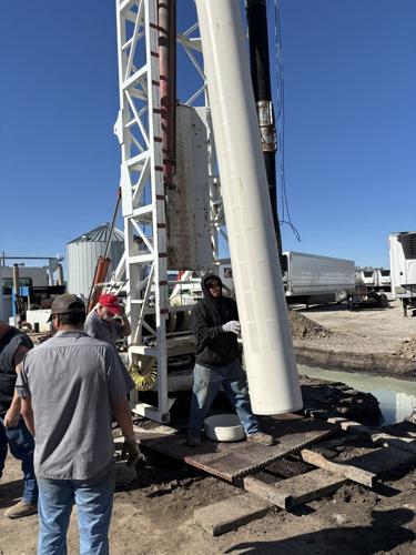 White casing measues 18 inches in diameter