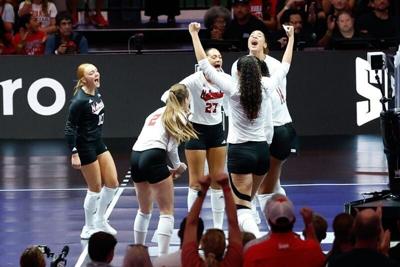 Aug 27, 2026; Arlington, TX, USA;  Nebraska Cornhuskers players celebrate a point during their volleyball match against the Florida Gators at AT&T Stadium.  Mandatory Credit: Chris Jones-Imagn Images