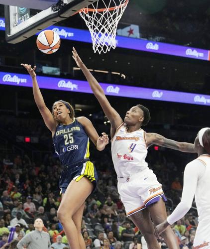 Phoenix Mercury forward Natasha Mack (4) pressures the shot by Dallas Wings forward Monique Billings (25) in the second half at