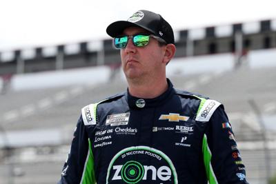 Jun 21, 2025; Long Pond, Pennsylvania, USA; NASCAR Cup Series driver Kyle Busch looks on from pit road during practice and qualifying for The Great American Getaway 400 at Pocono Raceway.