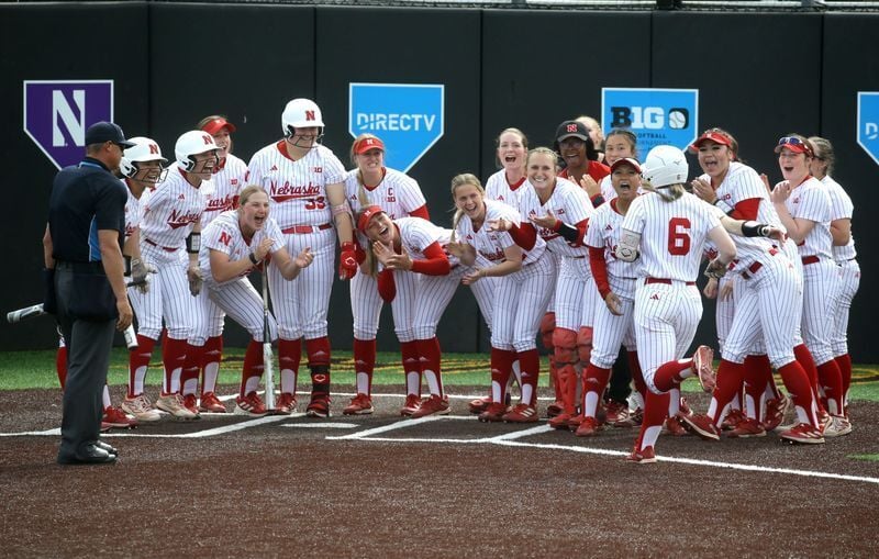 Nebraskaâ€™s Billie Andrews (6) is greeted by her teammates after hitting a homerum in the Big Ten softball tournament Friday, May 10, 2024 in Iowa City, Iowa.