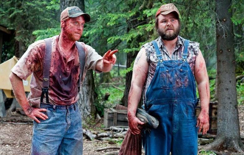 Alan Tudyk (left) and Tyler Labine play good-natured country boys mistaken for hardcore killers in the horror comedy "Tucker & Dale vs. Evil."
